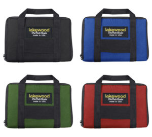 A group of four different colored bags with handles.